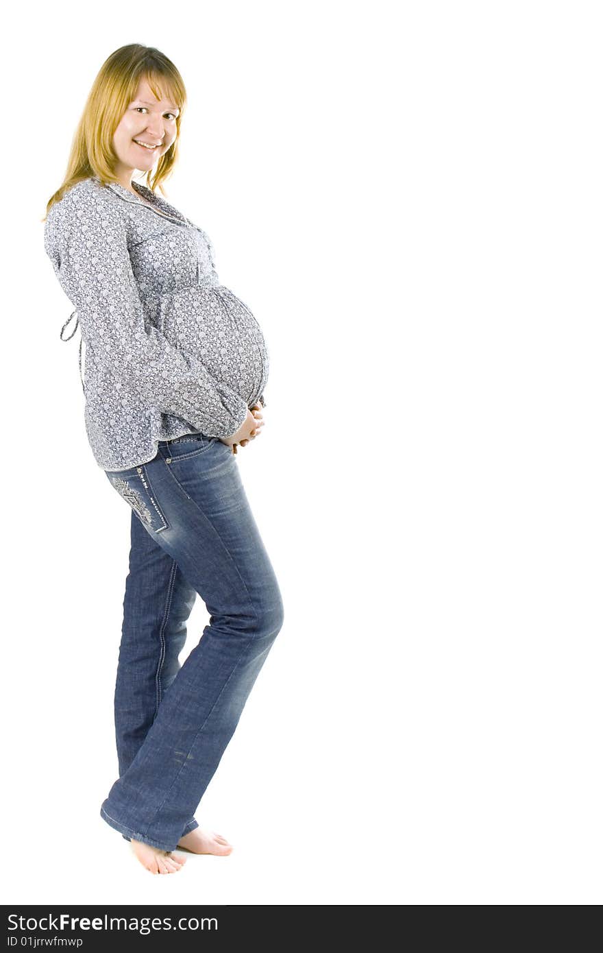 Young pregnant woman on white background