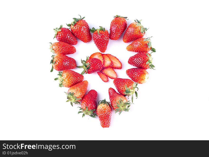 Fresh juicy strawberry isolated on white with heart shape