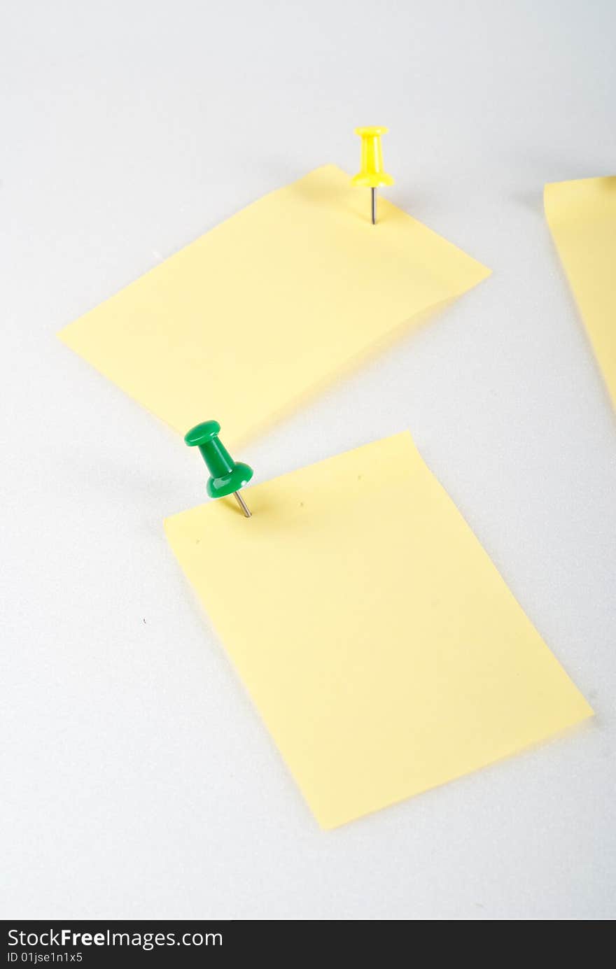 Post-it note with pin