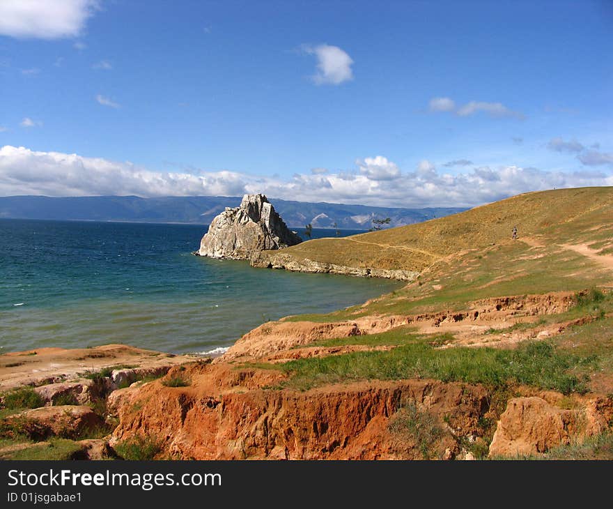 Lake Baikal. Island Olkhon. Rock Shamanka, a cult place of Buryat people. Lake Baikal. Island Olkhon. Rock Shamanka, a cult place of Buryat people.