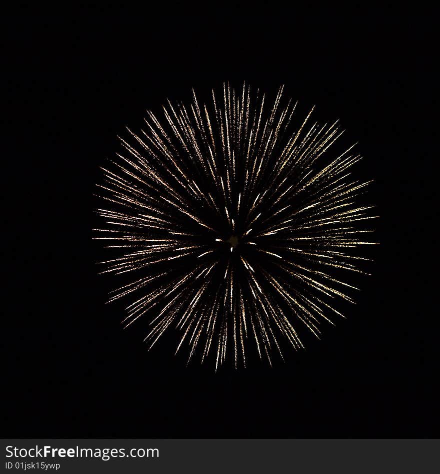 Firework explosion in black sky in a form of fireball. Firework explosion in black sky in a form of fireball