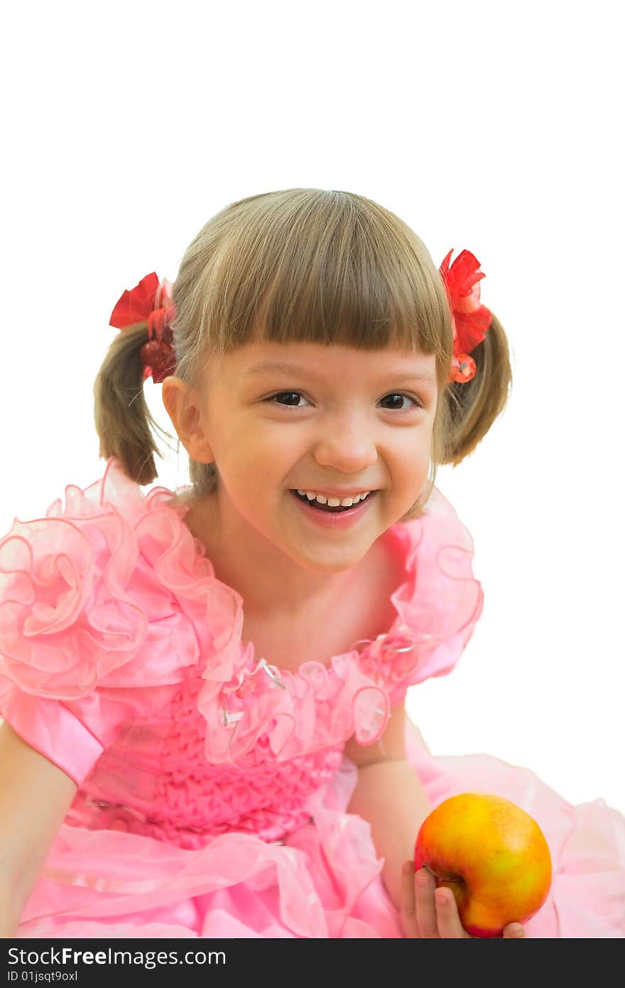 Young girl in pink dress with red and yellow apple in her hand. Young girl in pink dress with red and yellow apple in her hand