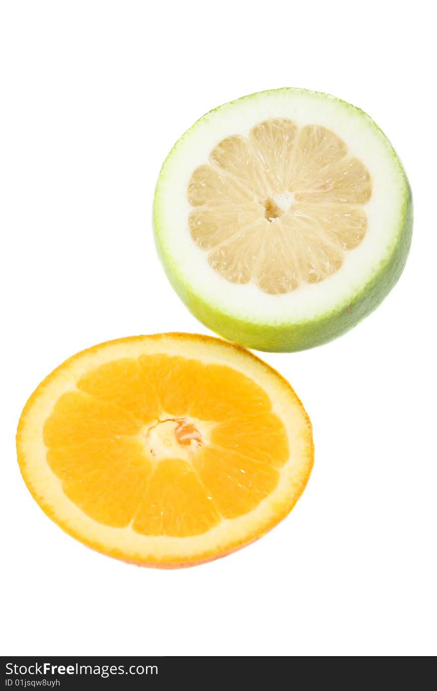 Freshly Sliced orange and lime on an isolated background. Freshly Sliced orange and lime on an isolated background