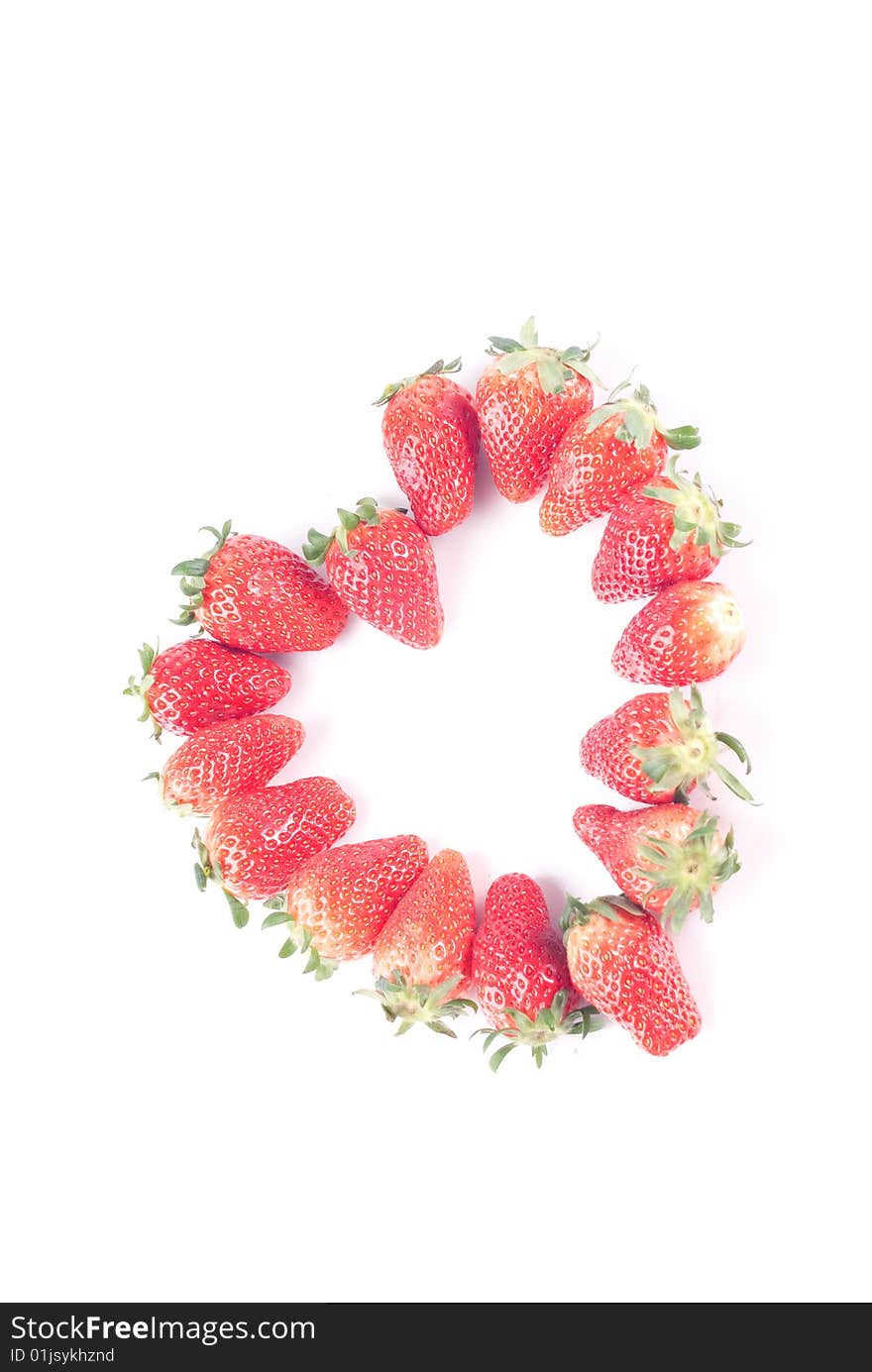 Fresh juicy strawberry isolated on white with heart shape