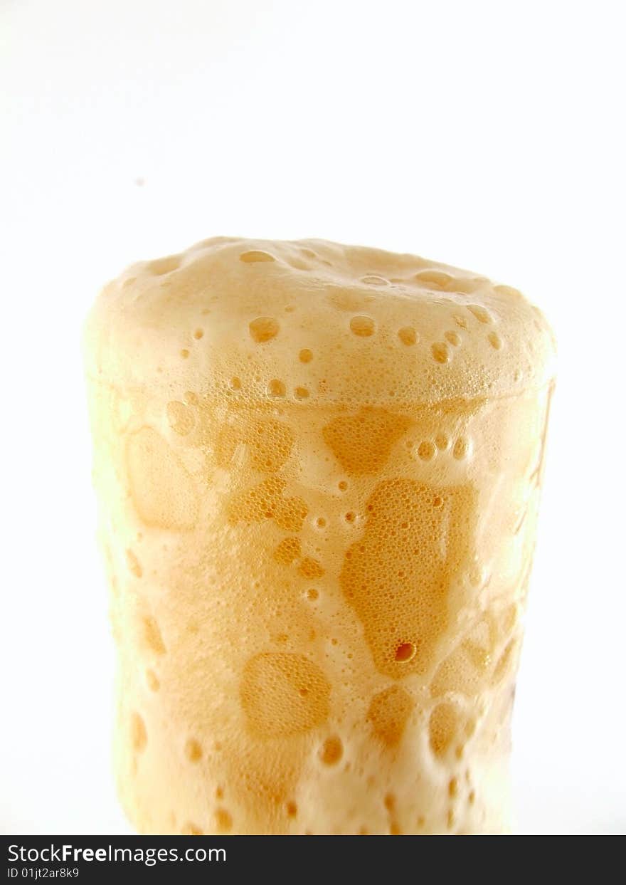 A glass of beer on white background. A glass of beer on white background