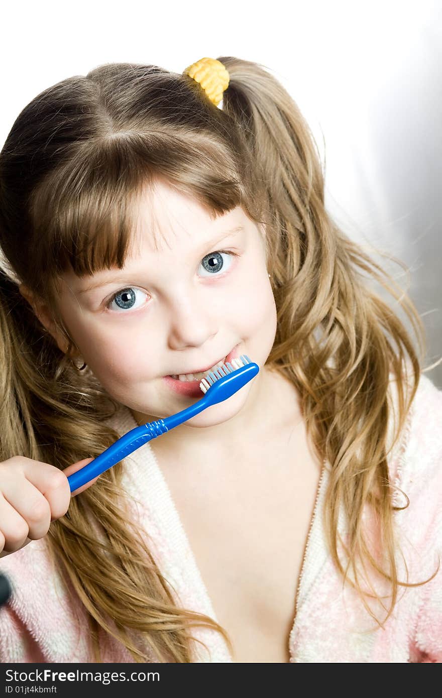 Girl with toothbrush