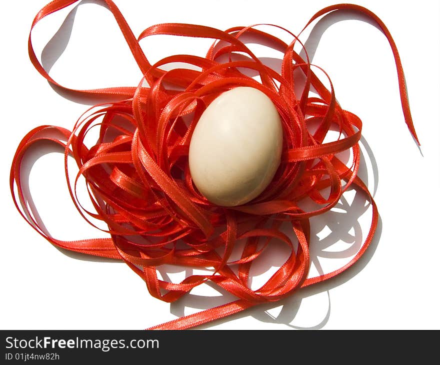 An Egg Is On A Ribbon