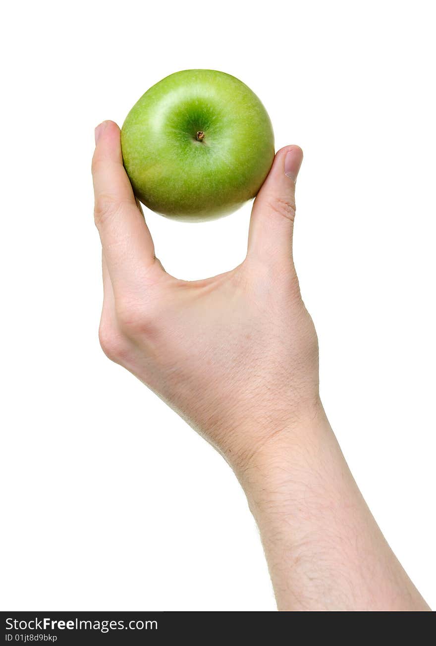 Hand holding green apple