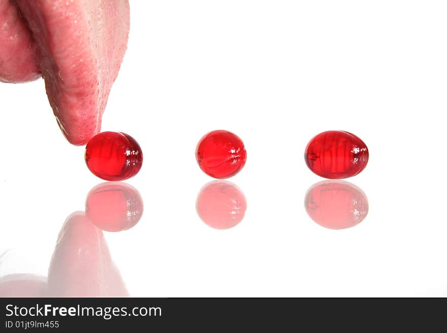 Red capsules isolated on white background. Red capsules isolated on white background.