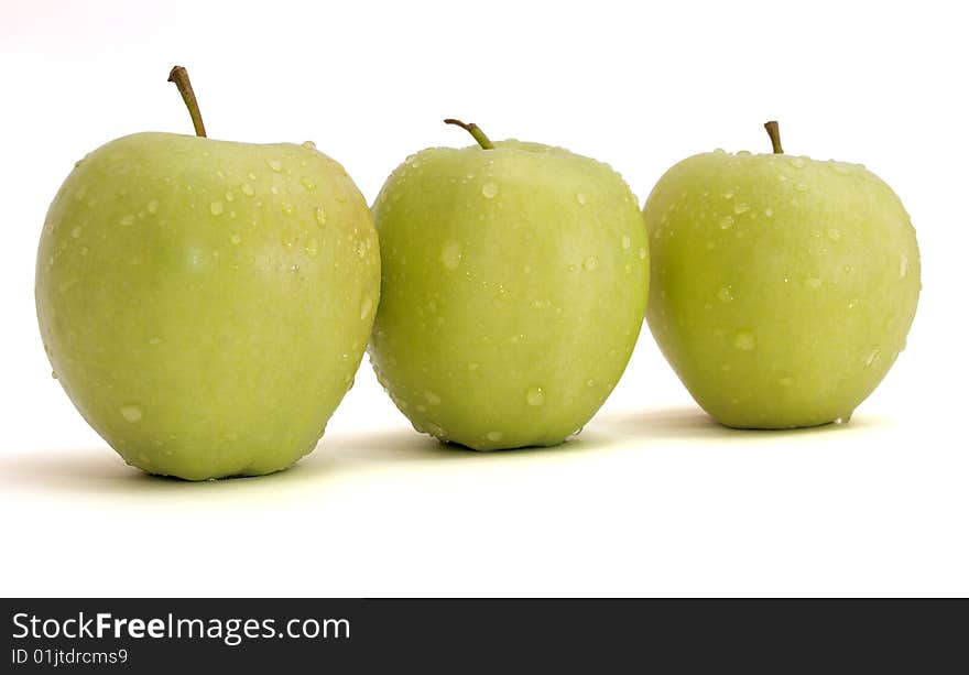 Color photo of green apples on white background