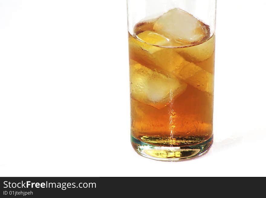 Glass of cold ice in isolated white background. Glass of cold ice in isolated white background