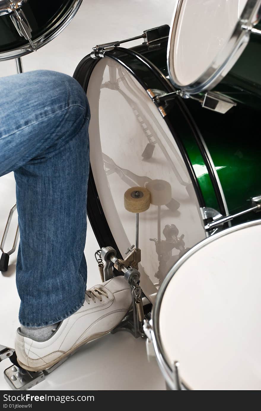 Close up of drummer feet on the  bass drum pedal,check also <a href=http://www.dreamstime.com/musical-instruments-and-musicians-rcollection9620-resi828293>Musical instruments and musicians</a>