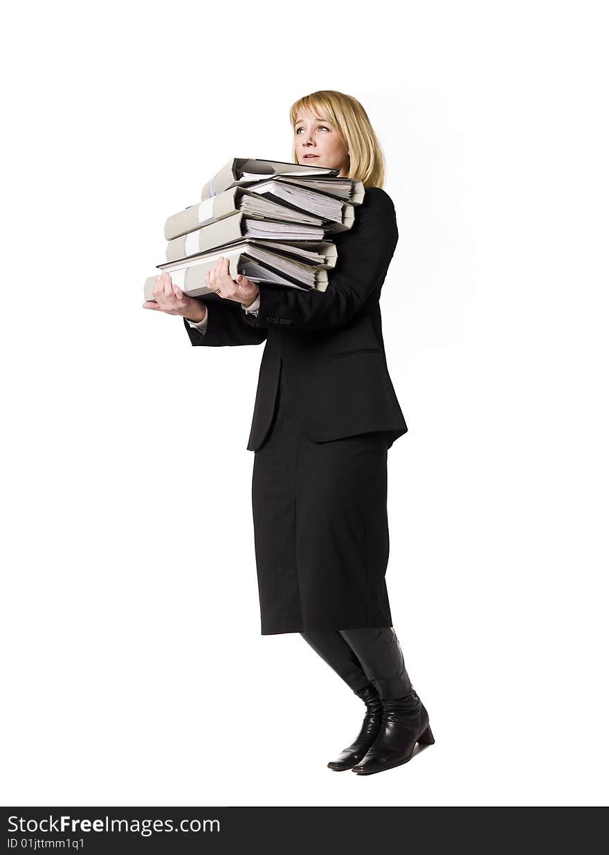 Woman carrying  folders towards white background. Woman carrying  folders towards white background