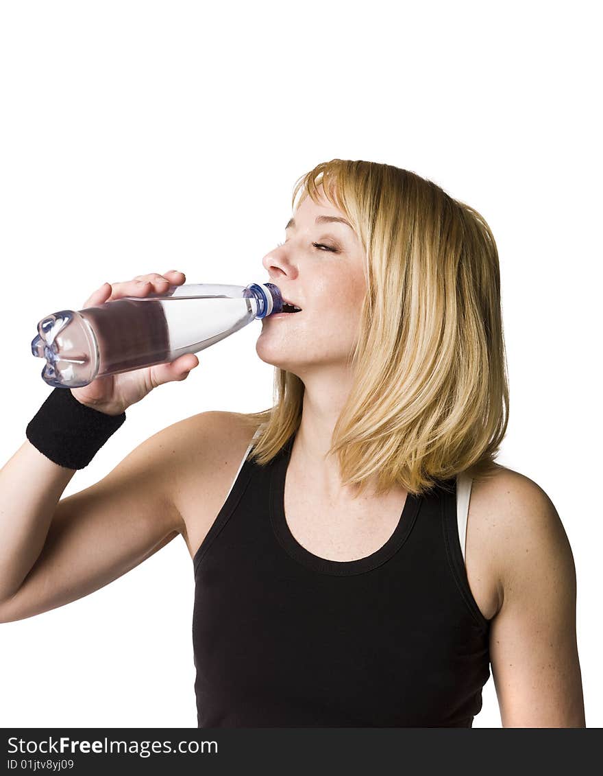 Girl drinking water towards white background