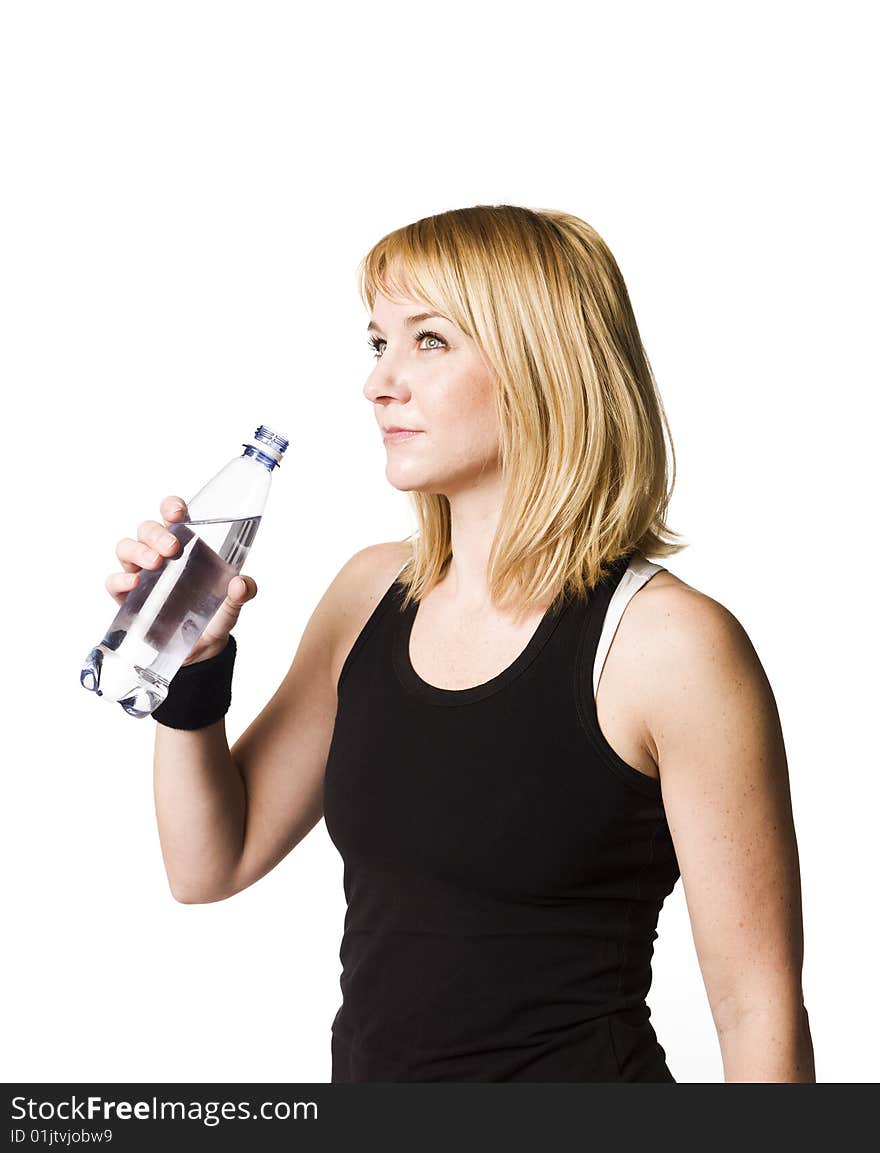 Girl drinking water towards white background