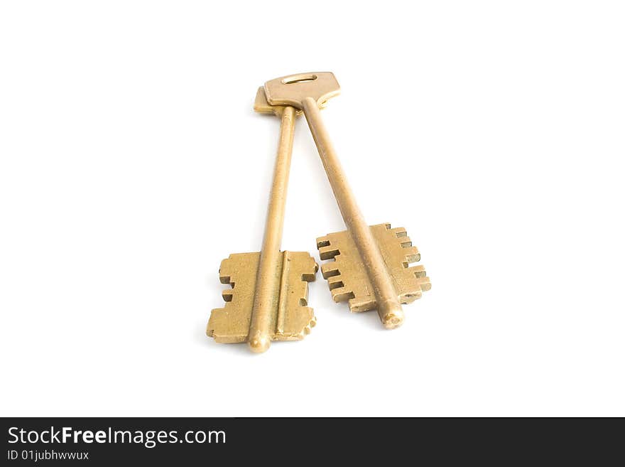 Gold key isolated on white background