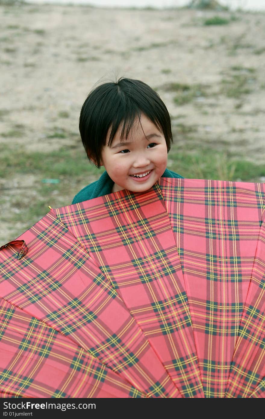 The lovely  little girl in the park.