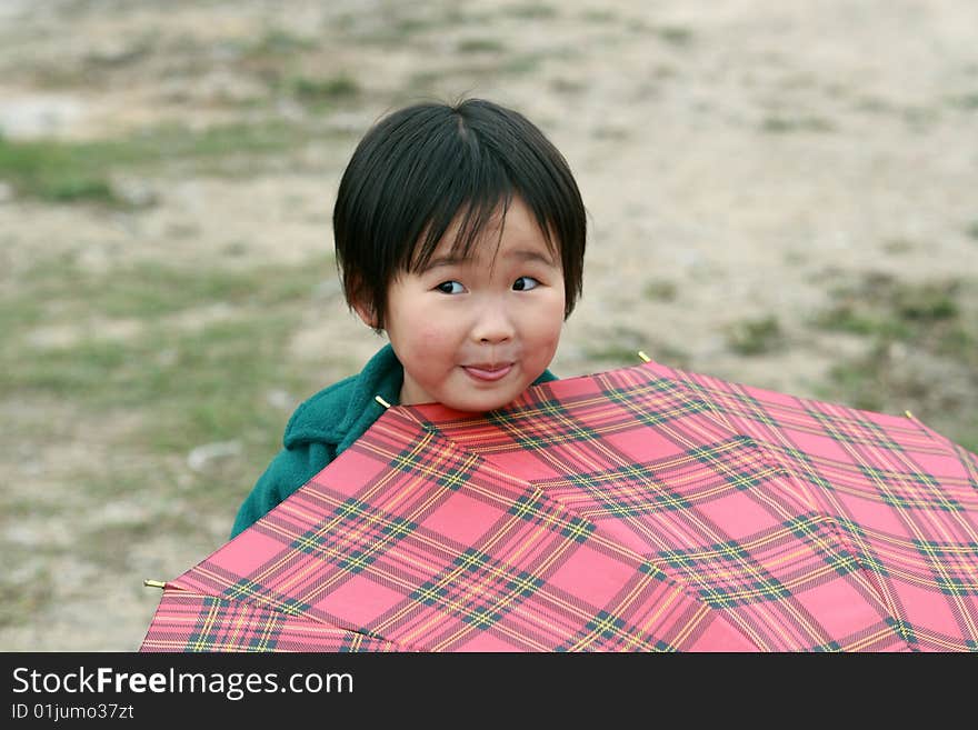 The lovely  little girl in the park.