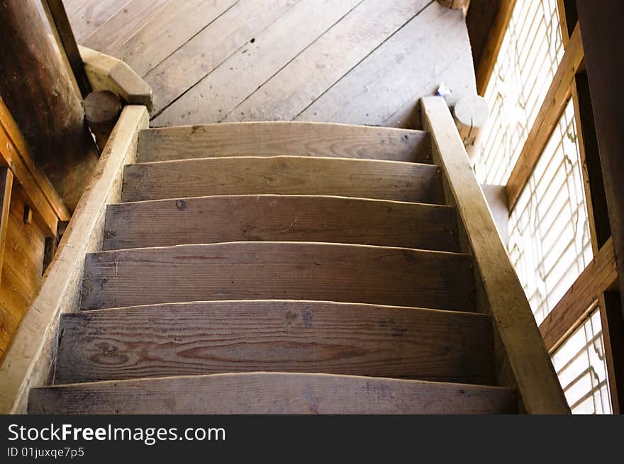 Chinese traditional staircase with beautiful tracery aside. Chinese traditional staircase with beautiful tracery aside