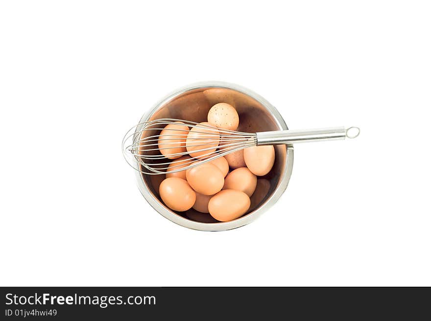 Eggs in a bowl with a whisk