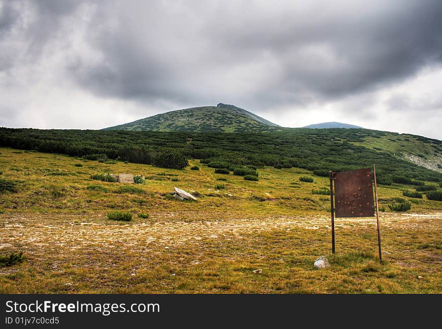 Old rusty sign in the middle of Rila mountains. Old rusty sign in the middle of Rila mountains