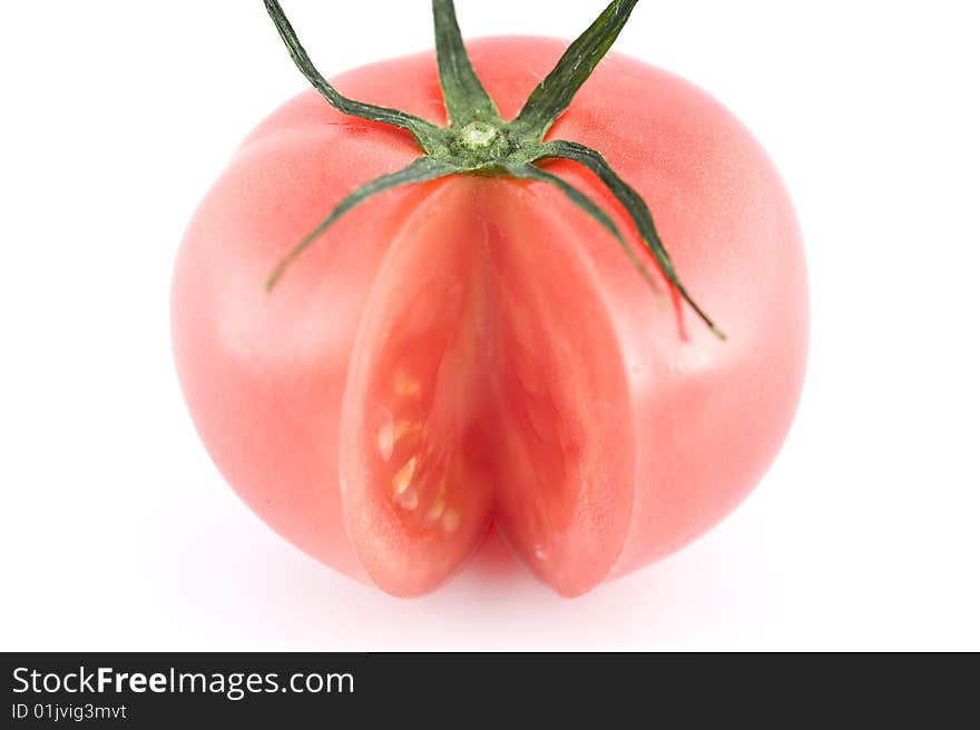 Cut tomato on white background. Cut tomato on white background