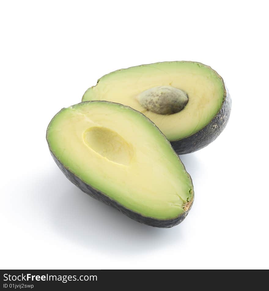 Cut avocado on white background