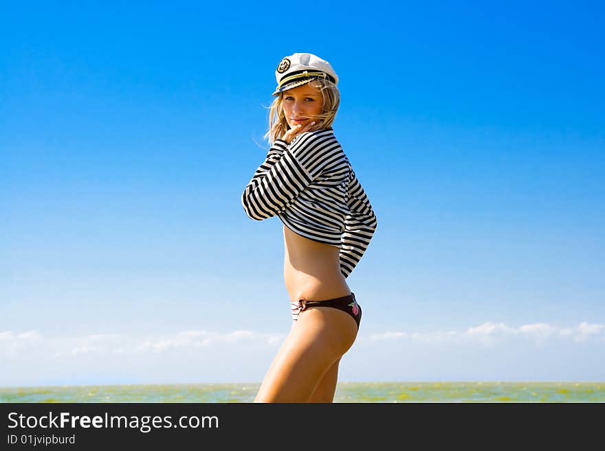 A young girl on the seashore, summer. A young girl on the seashore, summer