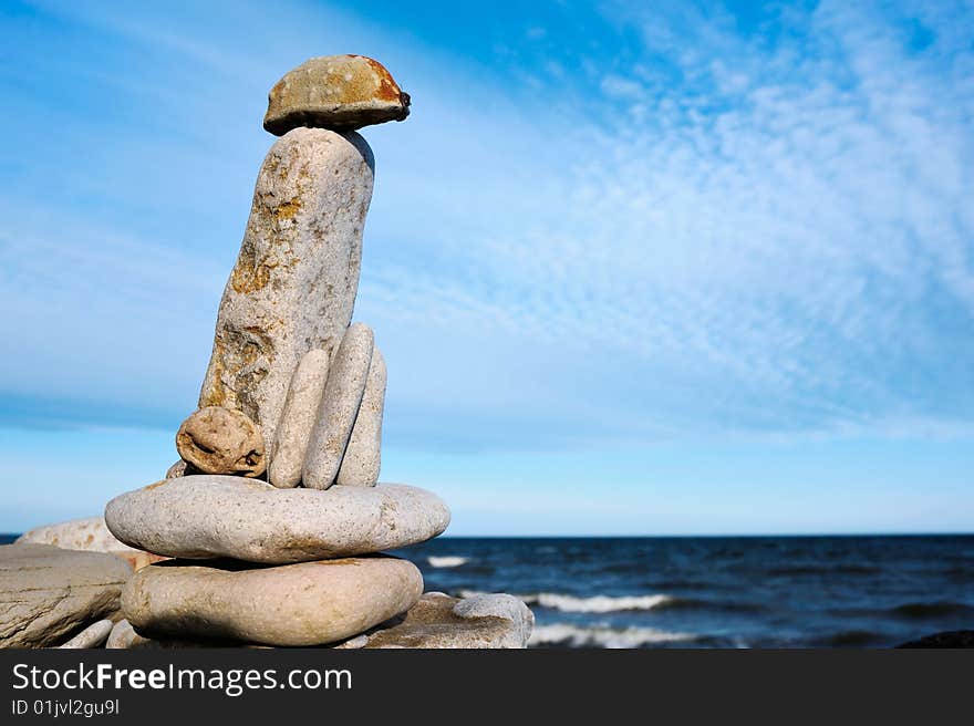 Towering stone from a group of gravel. Towering stone from a group of gravel