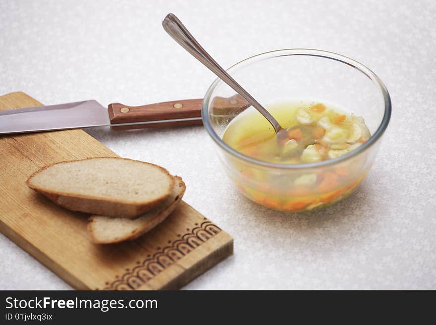 A photo of plate of with soup