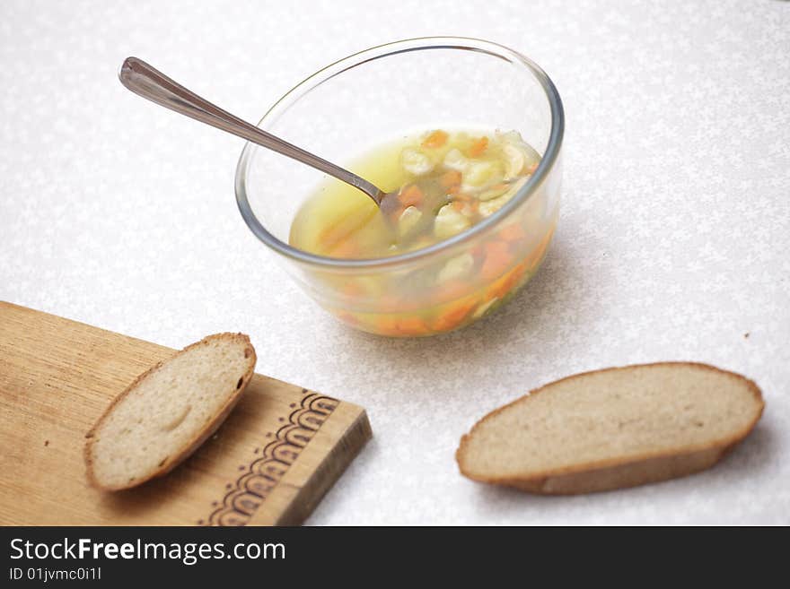 A photo of plate of with soup