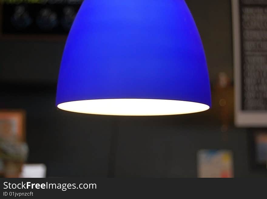 Blue lamp in a coffee shop