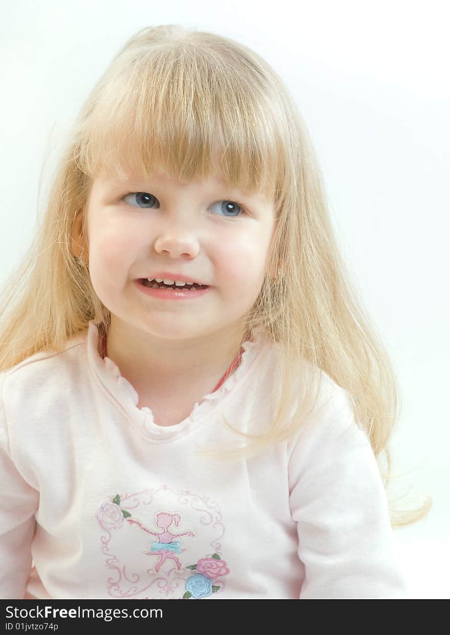 Portrait of smiling blue eyed blonde girl. Portrait of smiling blue eyed blonde girl