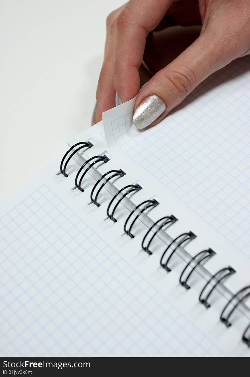 An isolated to White image of a Notepad. An isolated to White image of a Notepad