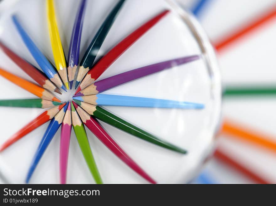 Closeup of colored pencils on white background