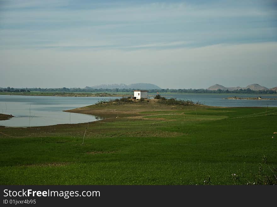 Lonely white house on the bank. Lonely white house on the bank