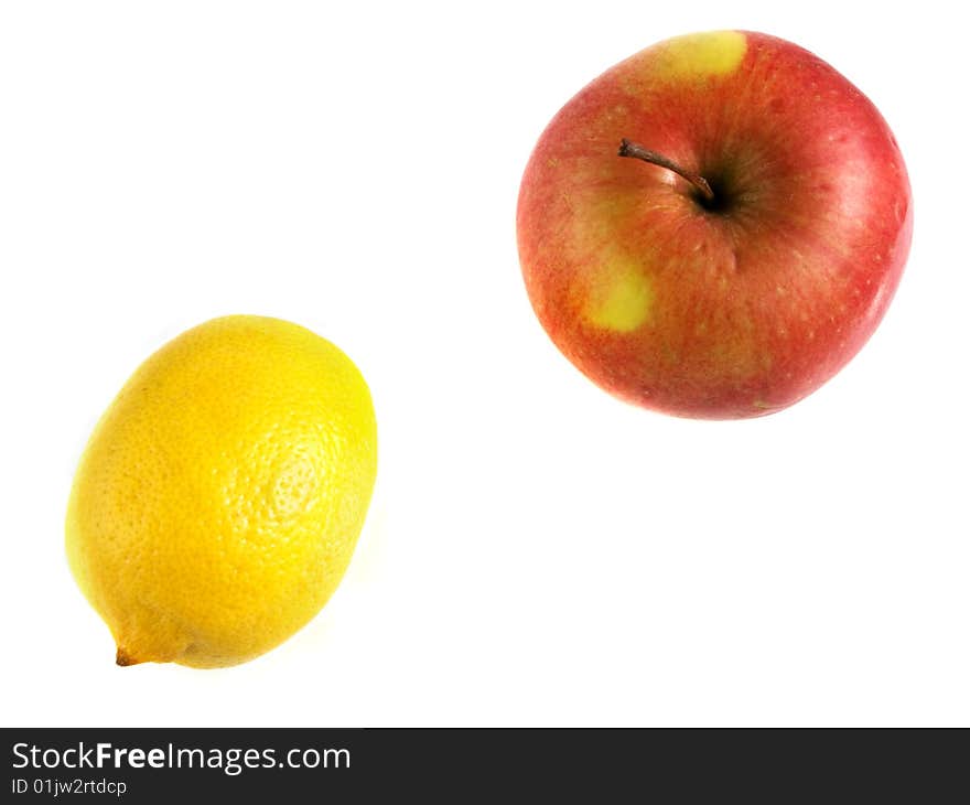 Lemon and apple isolated on white background