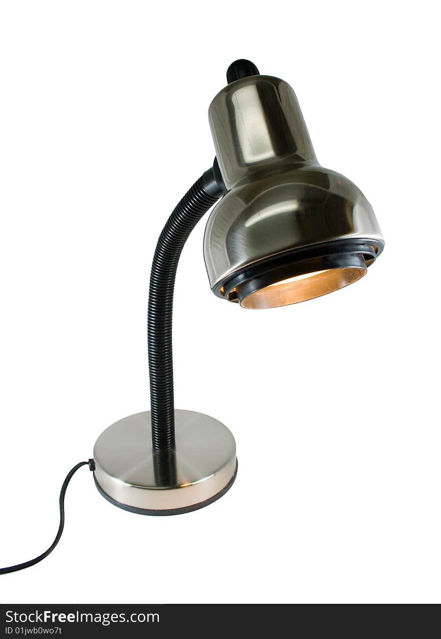 A chrome, goose-neck desk lamp on an isolated background. A chrome, goose-neck desk lamp on an isolated background