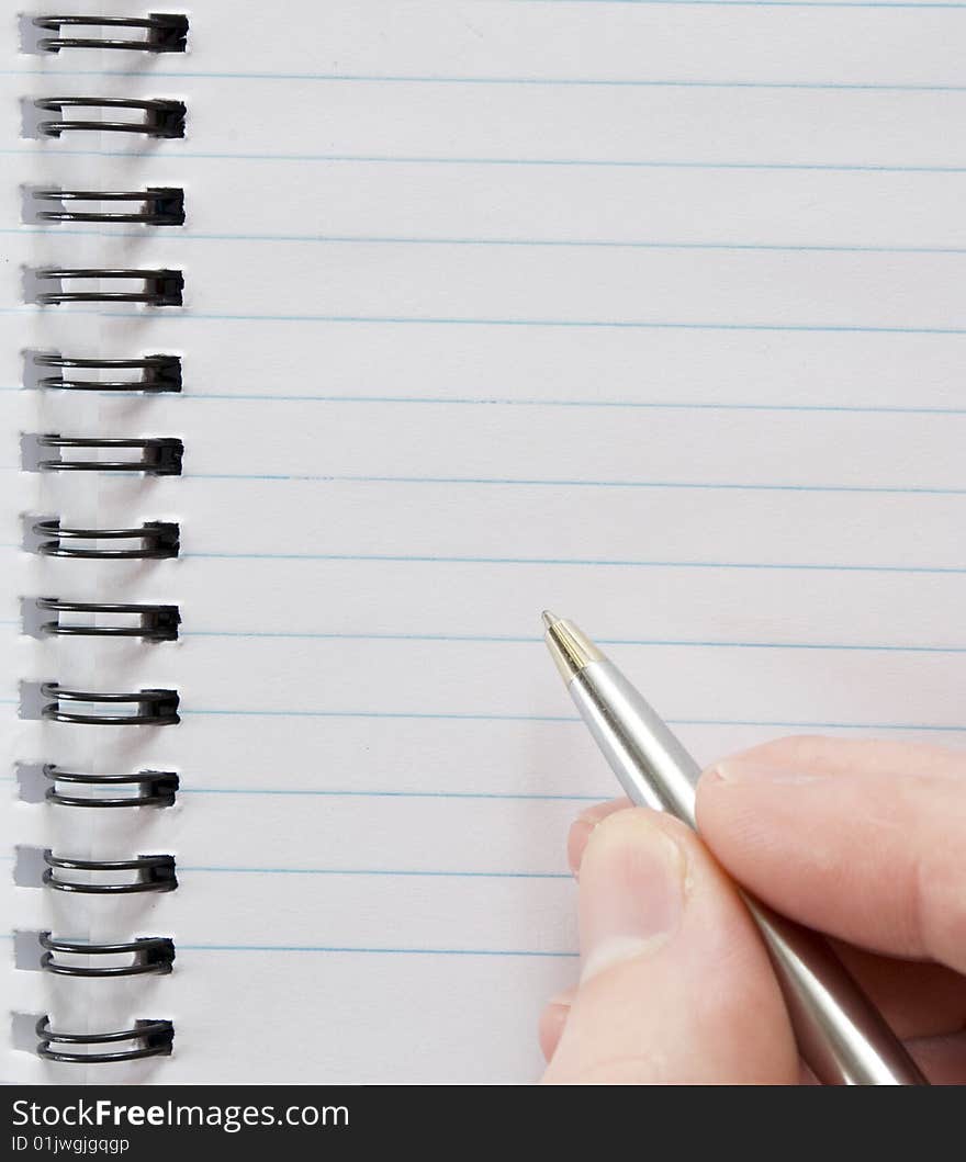 Close-up of male hand with pen ready for writing. Close-up of male hand with pen ready for writing