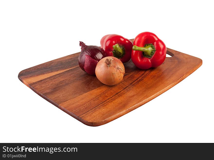 Vegetables and knife on cutting board