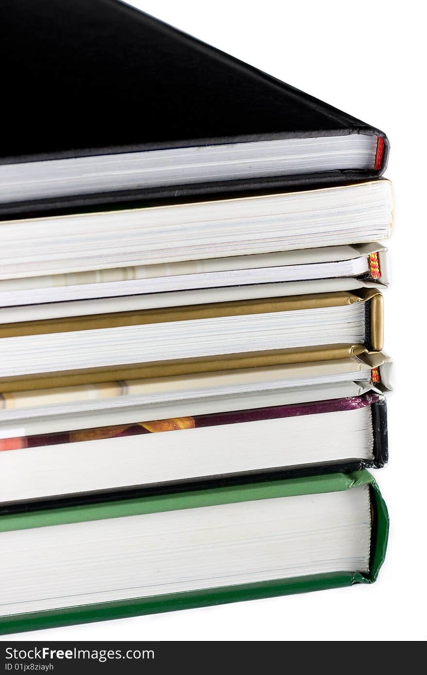 A stack of books on white background