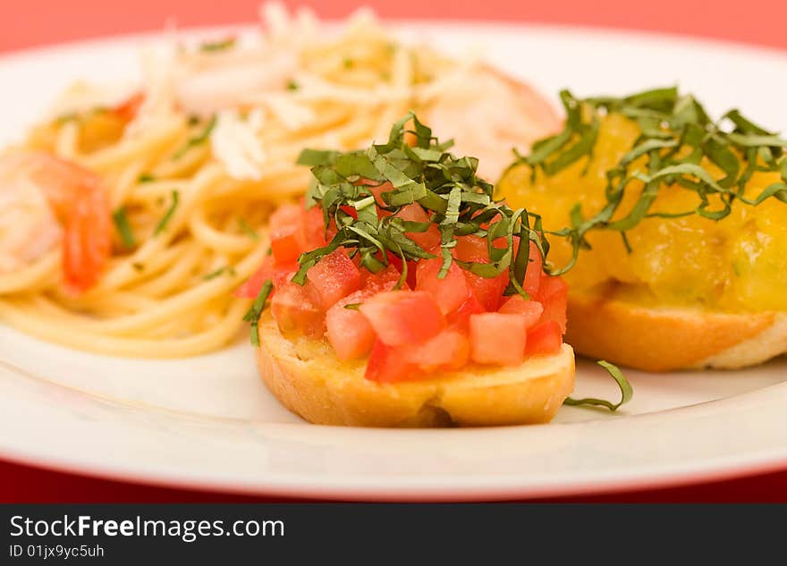 Shrimp pasta with garlic herb butter sauce and tomato and basil bruchetta. Shrimp pasta with garlic herb butter sauce and tomato and basil bruchetta