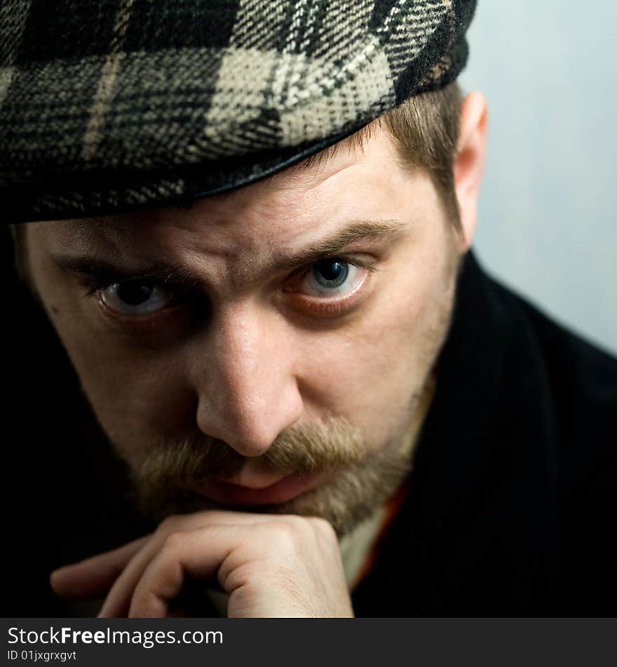 Stock photo: an image of a man in a cap