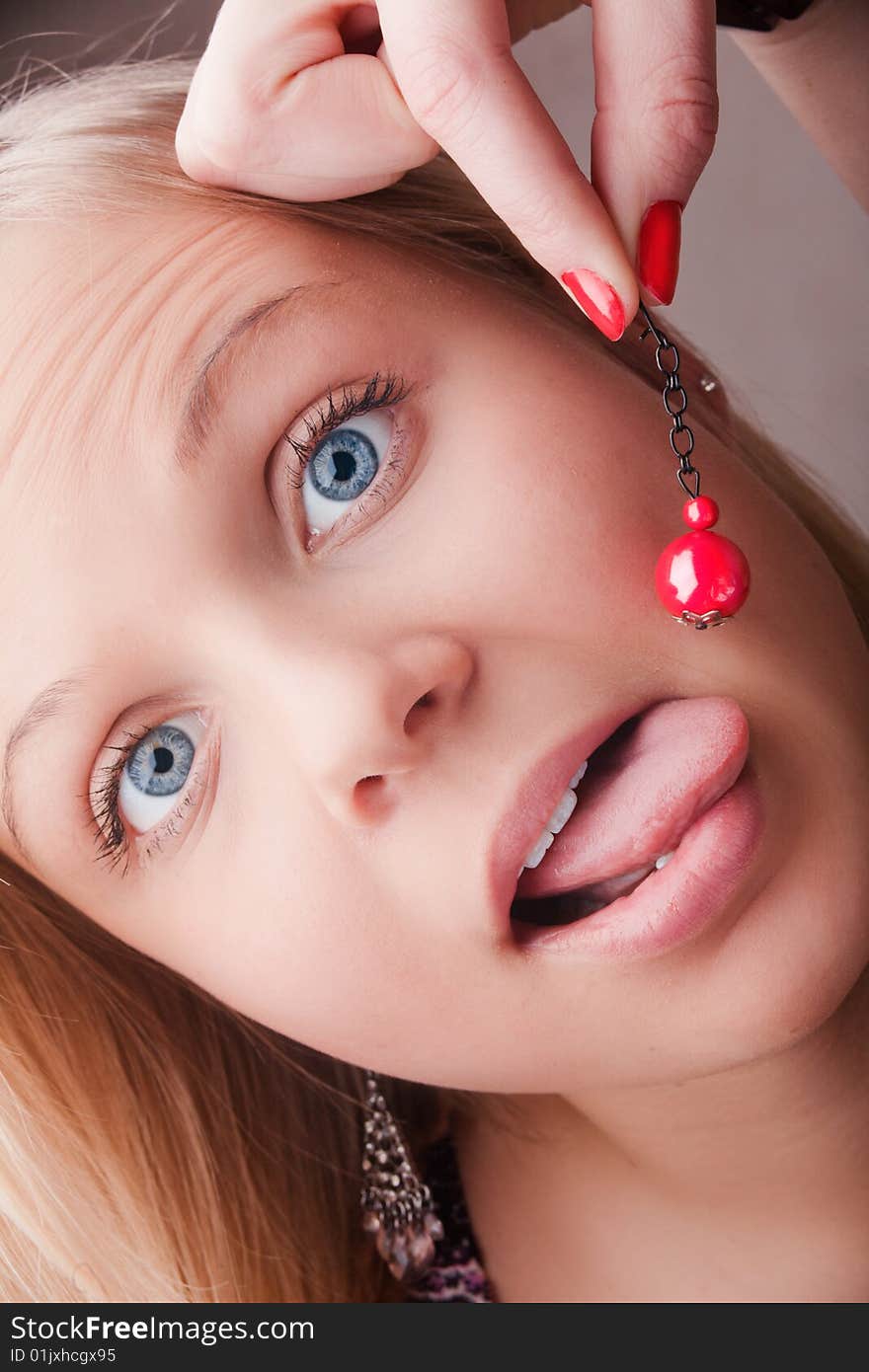 Girl Face With Red Earring