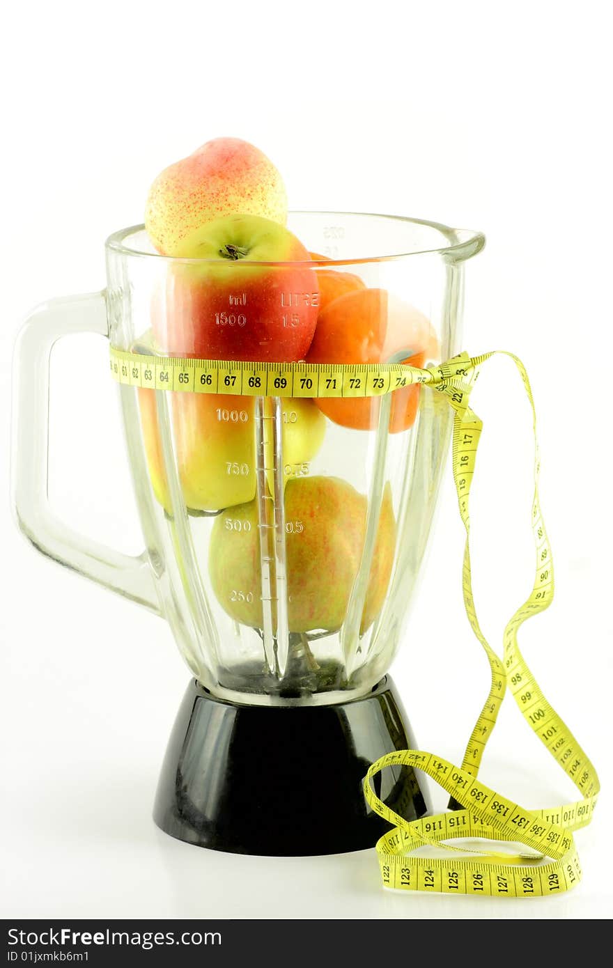 Fruits in mixer and tape, apple, peach