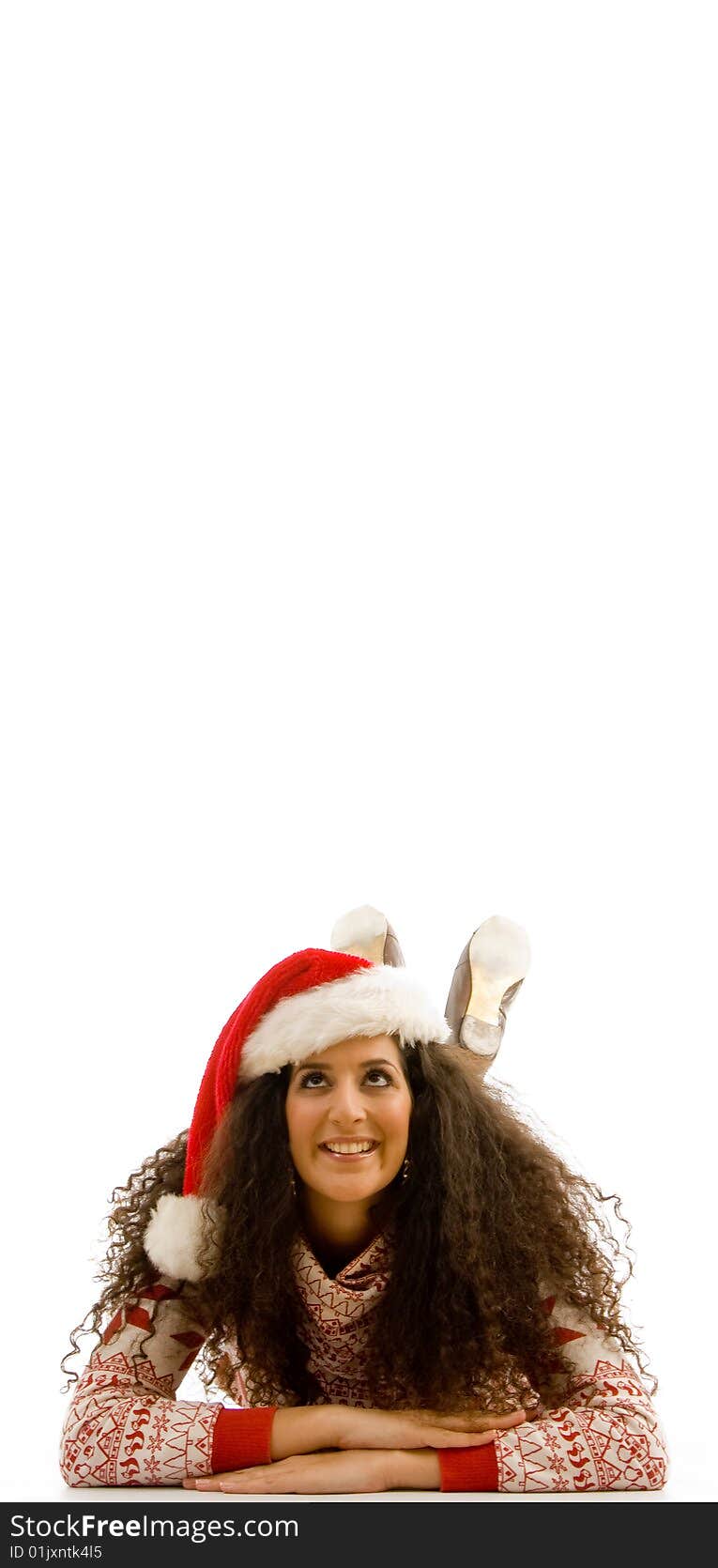 Model wearing christmas hat and looking at camera