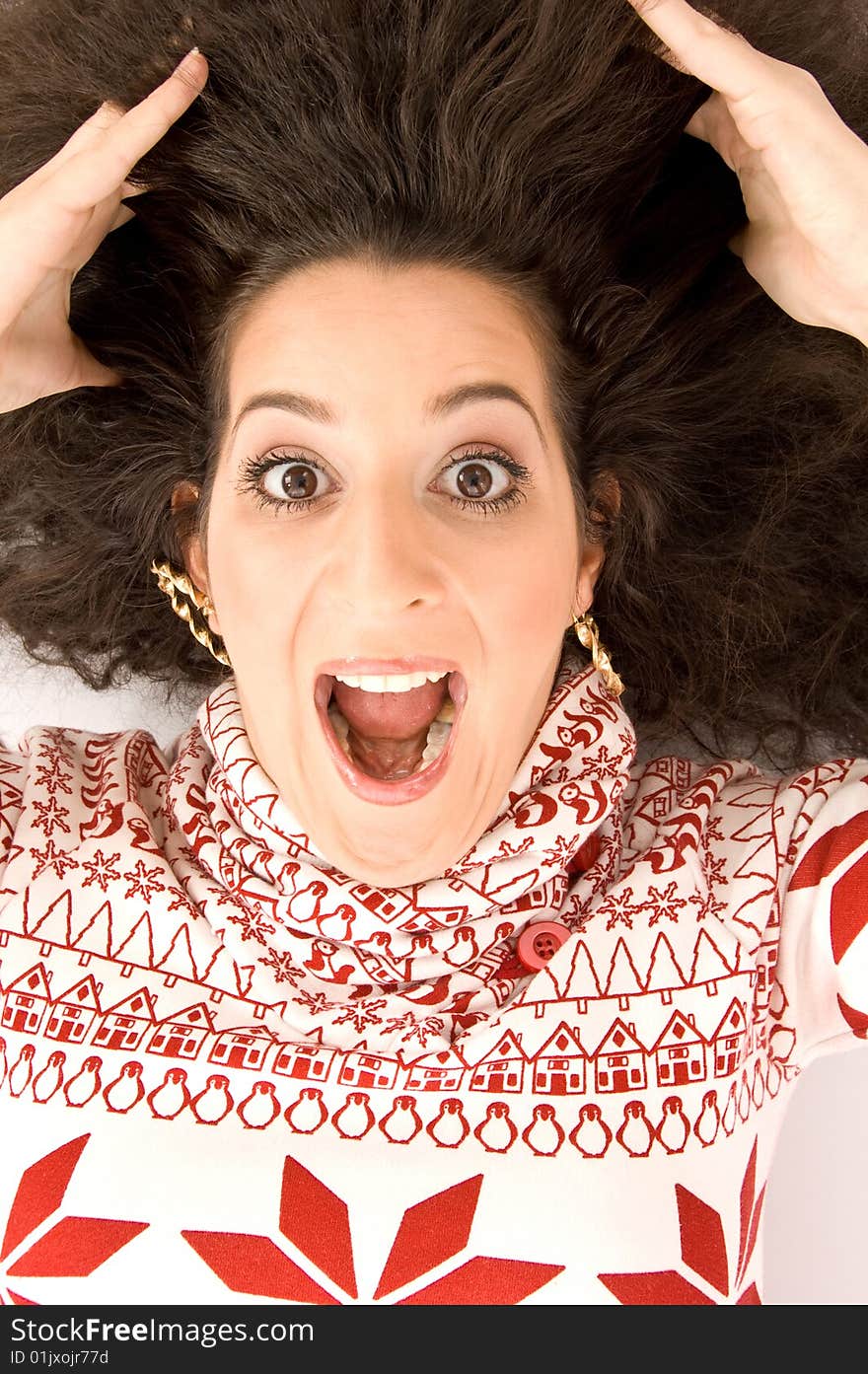 Fashionable woman surprised and looking upwards with white background