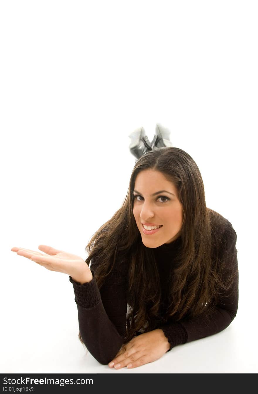 Hispanic female posing with hand gesture against white background