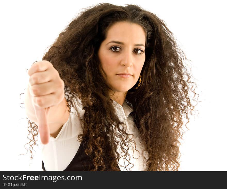 Hispanic female showing thumbs down against white background