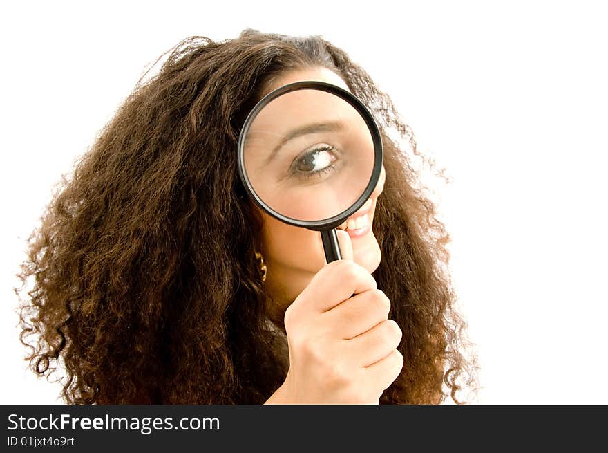 Latin american model holding magnifier on an isolated background